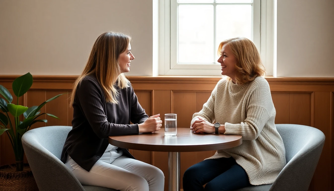 Two women talking warmly across a table